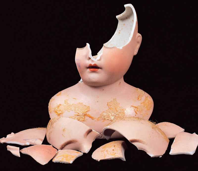 German Bisque Headed Porcelain Doll Broken into multiple pieces and shards.